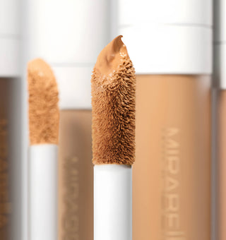 Close-up of Mirabella Invincible For All Perfecting Concealer: large doe-foot applicator with a slanted tip for precise application.