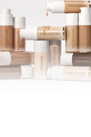 Image of Mirabella Invincible For All Anti Aging HD Foundations stacked on top of one another with white base.