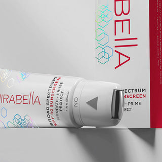 Image of Mirabella Beauty's Hydrate Prime Protect SPF 30 Makeup Primer showcasing the tube's metal roller applicator for hands-free application.