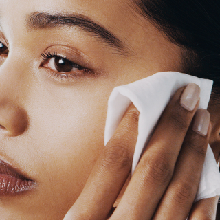 Image of model removing makeup gently with Mirabella Makeup Remover wipes.