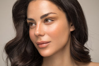 beautiful woman with radiant, natural-looking skin showcasing the skin-first beauty trend and a flawless complexion create with Mirabella Beauty