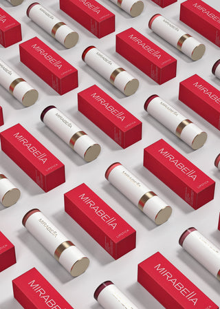 Mirabella lipstick delivering bold, vibrant color with a creamy, hydrating formula showing white cosmetics packaging