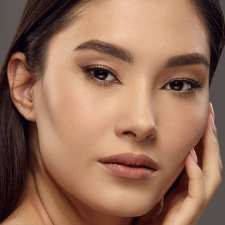 Image of up-close Mirabella Beauty Makeup model wearing the Invincible for All Hd Foundation, Undereye concealer, and mineral-based pressed powder.