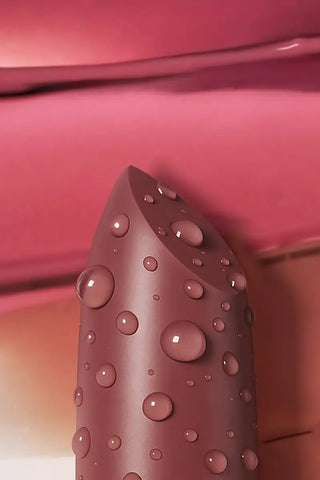 Mirabella Sealed with a Kiss Lipstick in nude shade with dewy water droplets, featured for National Lipstick Day 2025.
