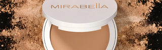 Open Mirabella Pure Press mineral powder compact with powder burst background, featured in October promotion.