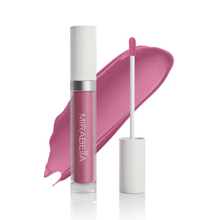 Mirabella Luxe Advanced Formula Lip Gloss in shade Sleek with glossy swatch behind the ornate lip gloss tube on a transparent background.
